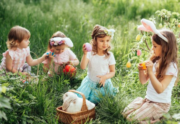 Easter,Egg,Hunt.,Group,Of,Children,Wearing,Bunny,Ears,Running