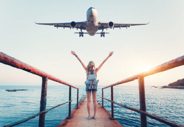 Airplane,And,Woman,At,Sunset.,Summer,Landscape,With,Girl,Standing