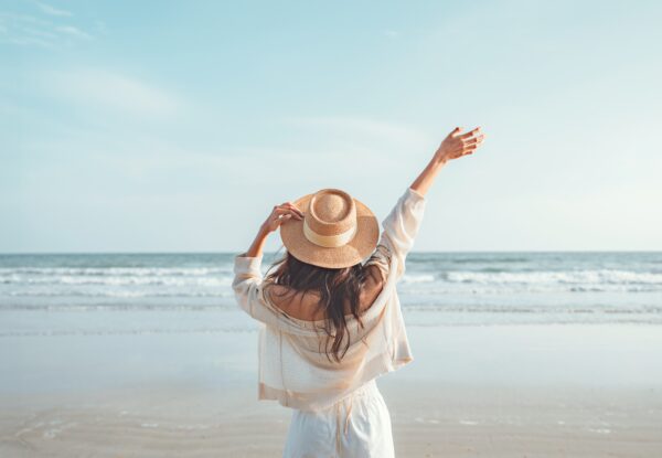 Summer,Beach,Vacation,Concept,,Happy,Young,Woman,With,Hat,Relaxing