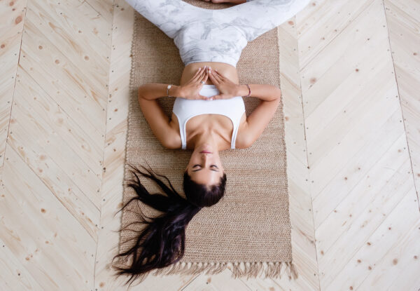 Top,View,Pacified,Brunette,Woman,In,Suit,Doing,Supta,Baddha