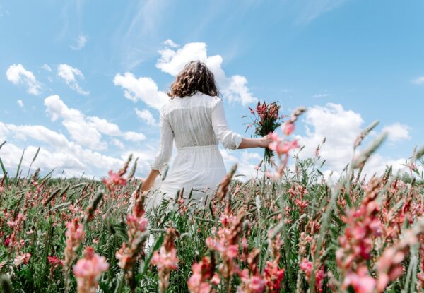 Back,View,Of,Woman,In,Long,White,Dress,With,A